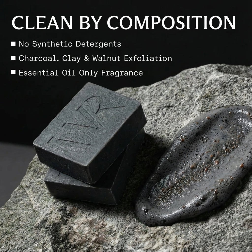 Black Wild Roman coconut oil soap bars on a stone surface with text about composition.