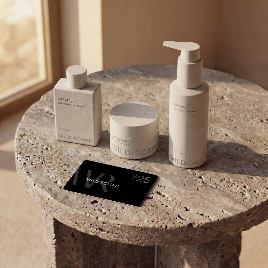 Cosmetic products on a stone surface with 'WILD-ROMAN' branding.